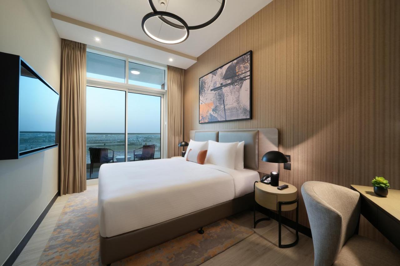 Damac Hills 2 Hotel, An Edge By Rotana Hotel Dubai Bagian luar foto