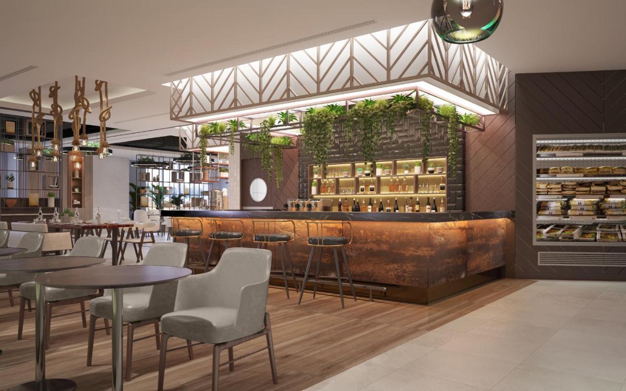 Damac Hills 2 Hotel, An Edge By Rotana Hotel Dubai Bagian luar foto